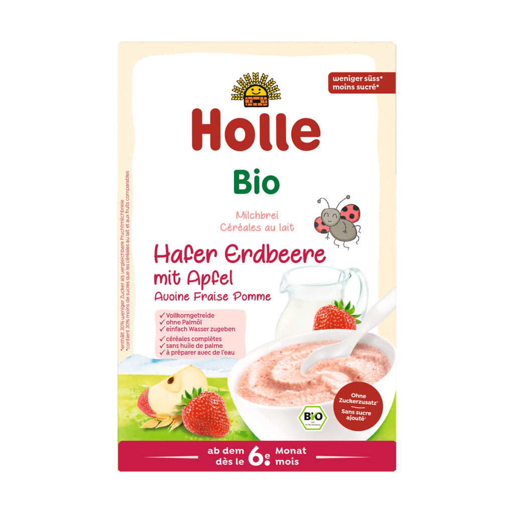 Organic milk cereal with oat, strawberry and apple